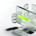 A translucent glass-like floating application-builder panel with a luminous horizontal credit meter draining from full to partial across its surface, surrounded by faint crystalline data-block structures representing app components, rendered in semi-realistic 3D concept-art style